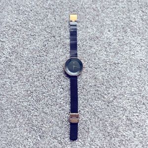 Never worn MVMT black and gold watch! Stainless steel, water resistant.